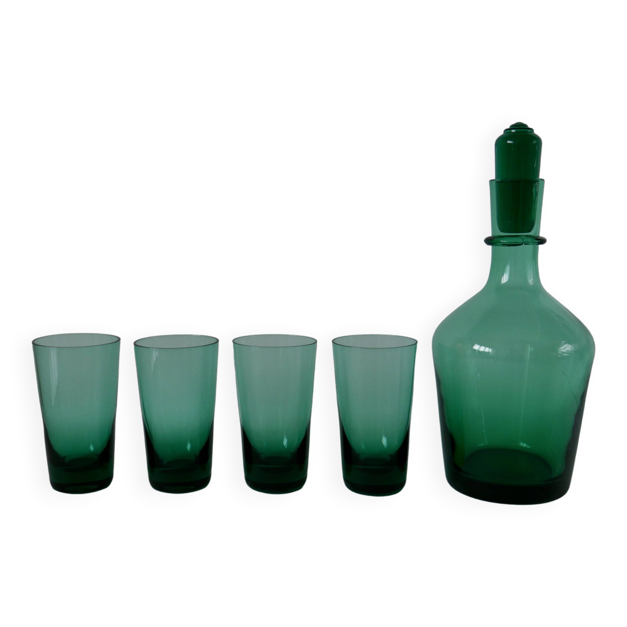 Set of a carafe and 4 designer glasses in green glass from the 70s