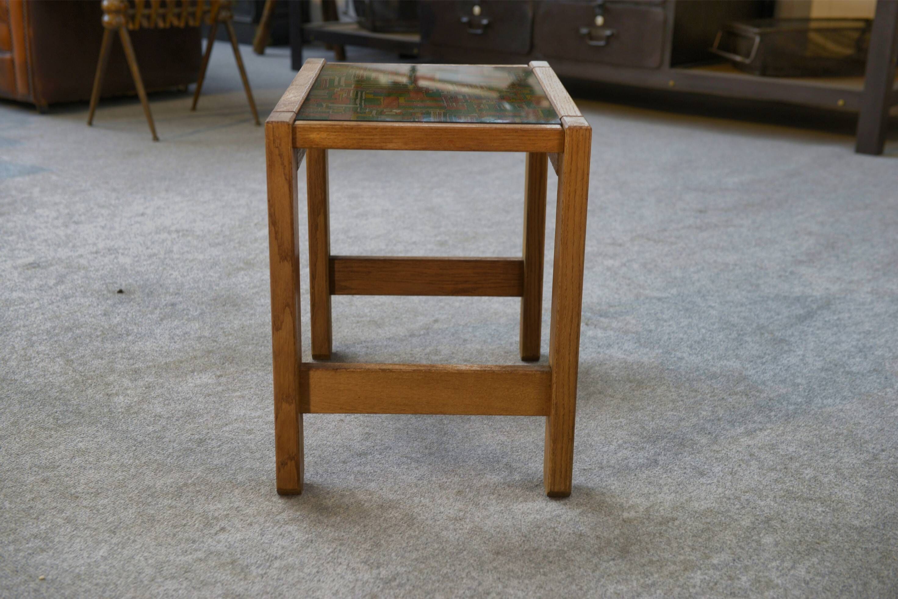 Occasional table in solid oak with a fabric top in the style of Guillerme and Chambron from the 1960s.