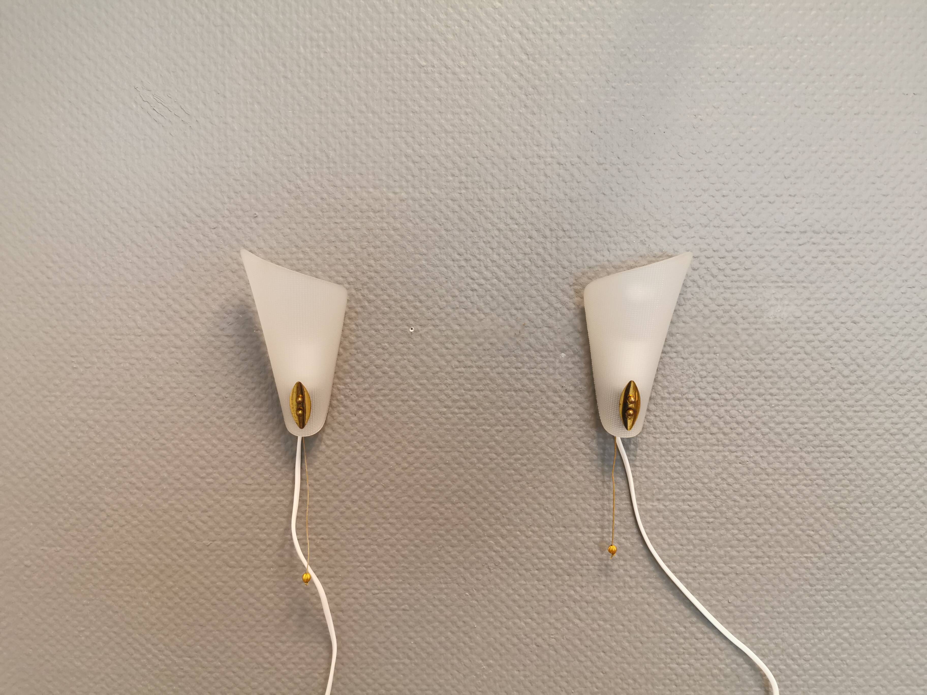 Two small Art Deco wall lights.