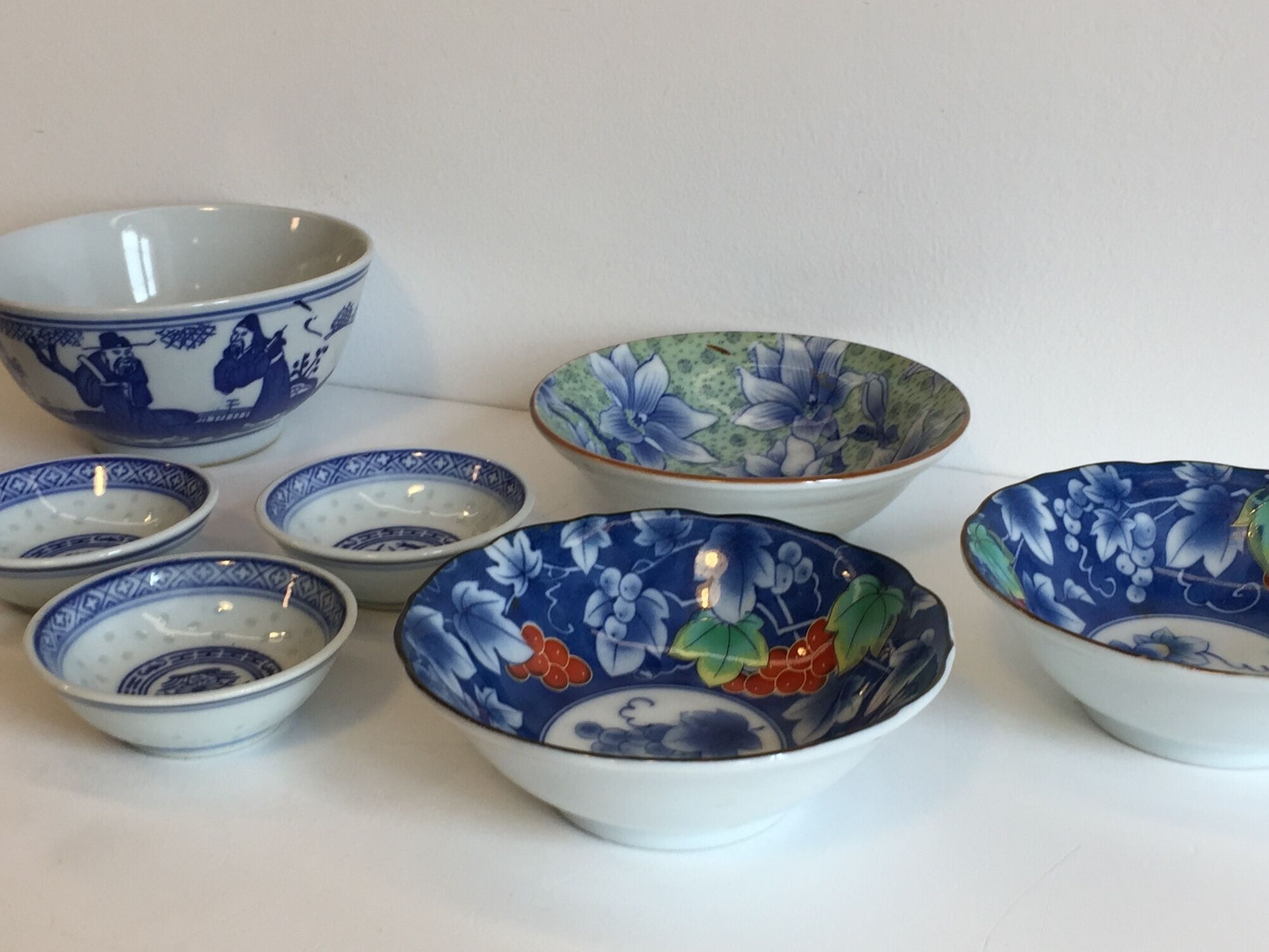 set of 4 bowls and 4 asian porcelain cups