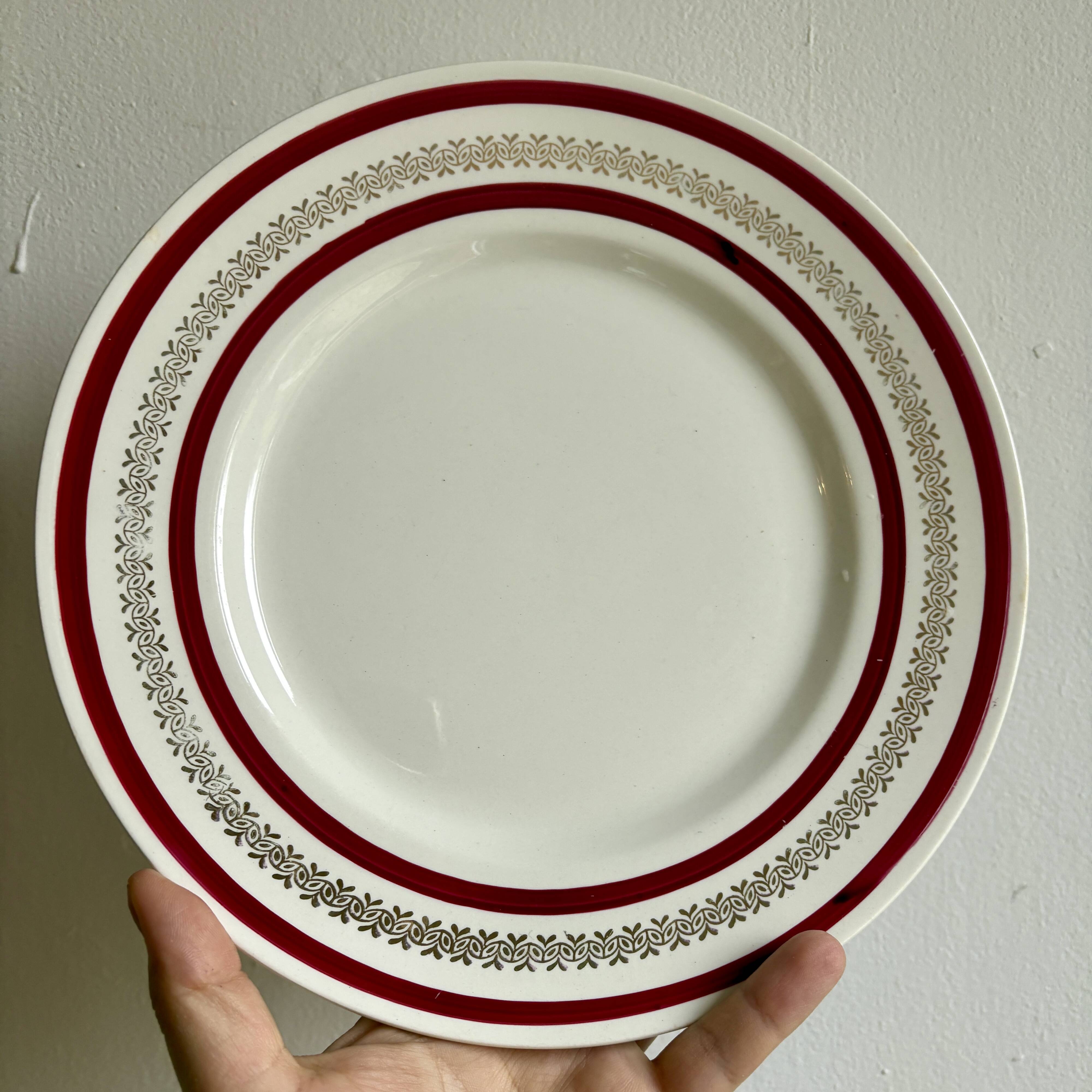 Set of 12 antique Gien red and gold dinner plates.