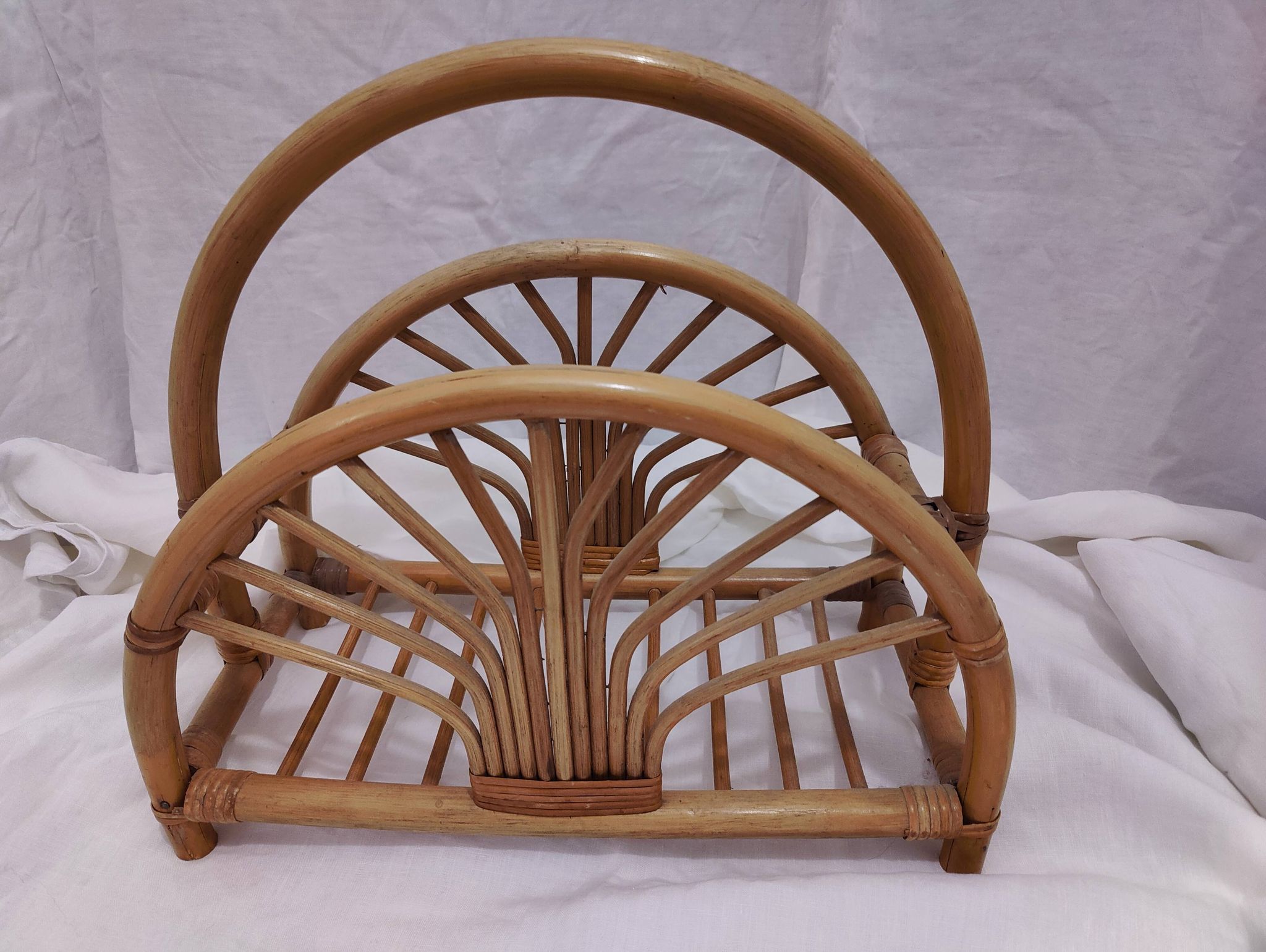 Woven bamboo magazine rack from the 1970s