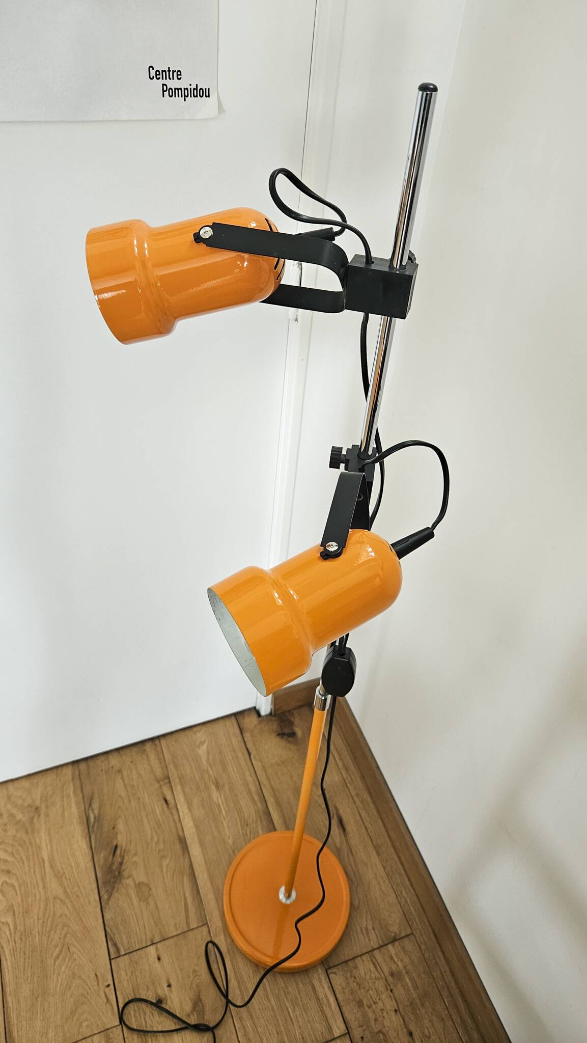 Vintage 1970s floor lamp with 2 spots, chrome, orange and black.