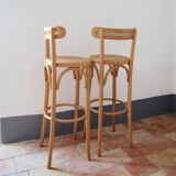 Wooden bar stools and cane
