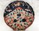 Imari porcelain dish from Japan in the shape of a scallop shell Blue, red and turquoise