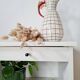 Vintage bedside table with tapered legs - white