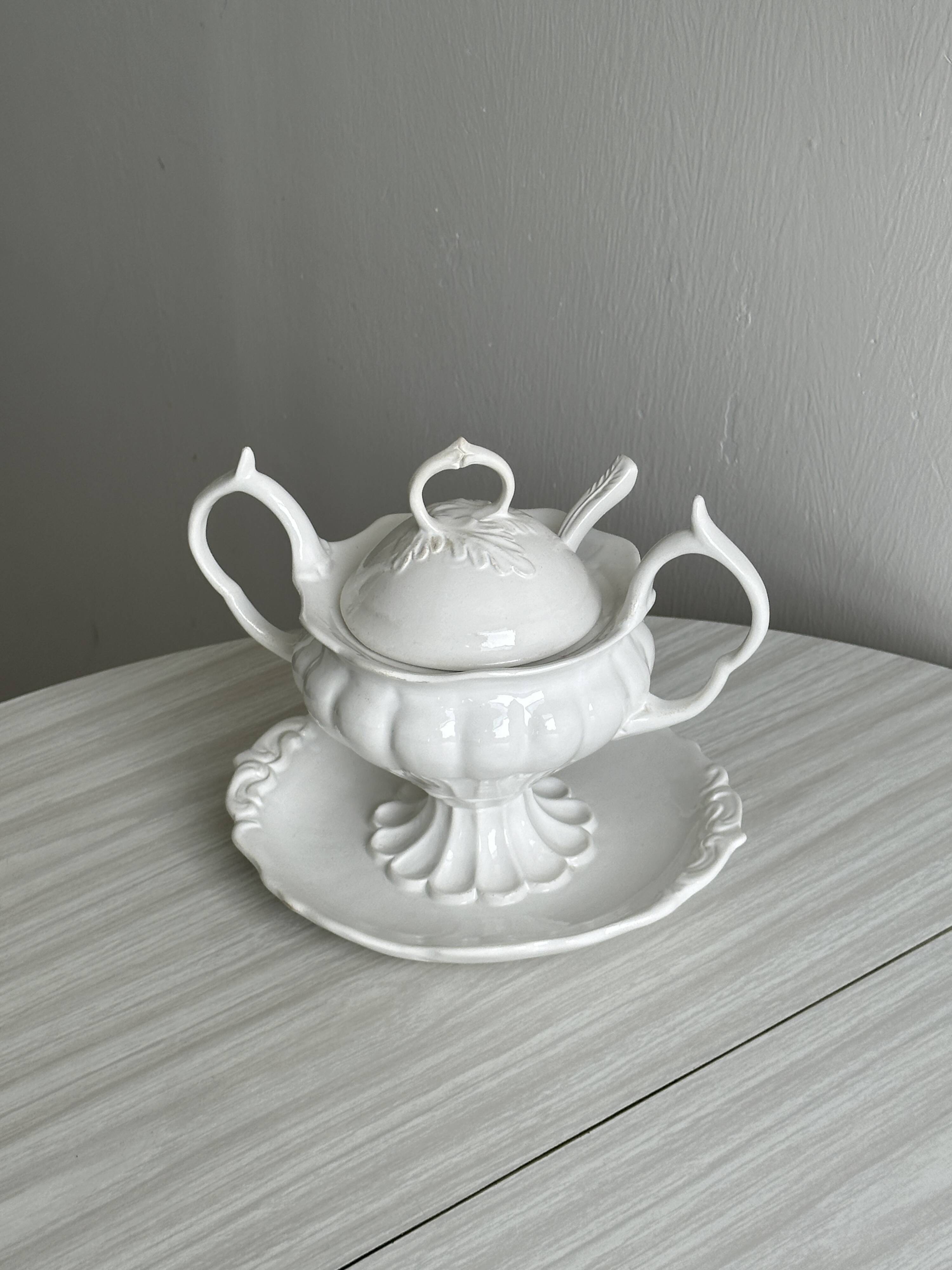 Antique white porcelain sauce boat