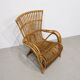 Vintage armchair from the 70s in natural rattan.