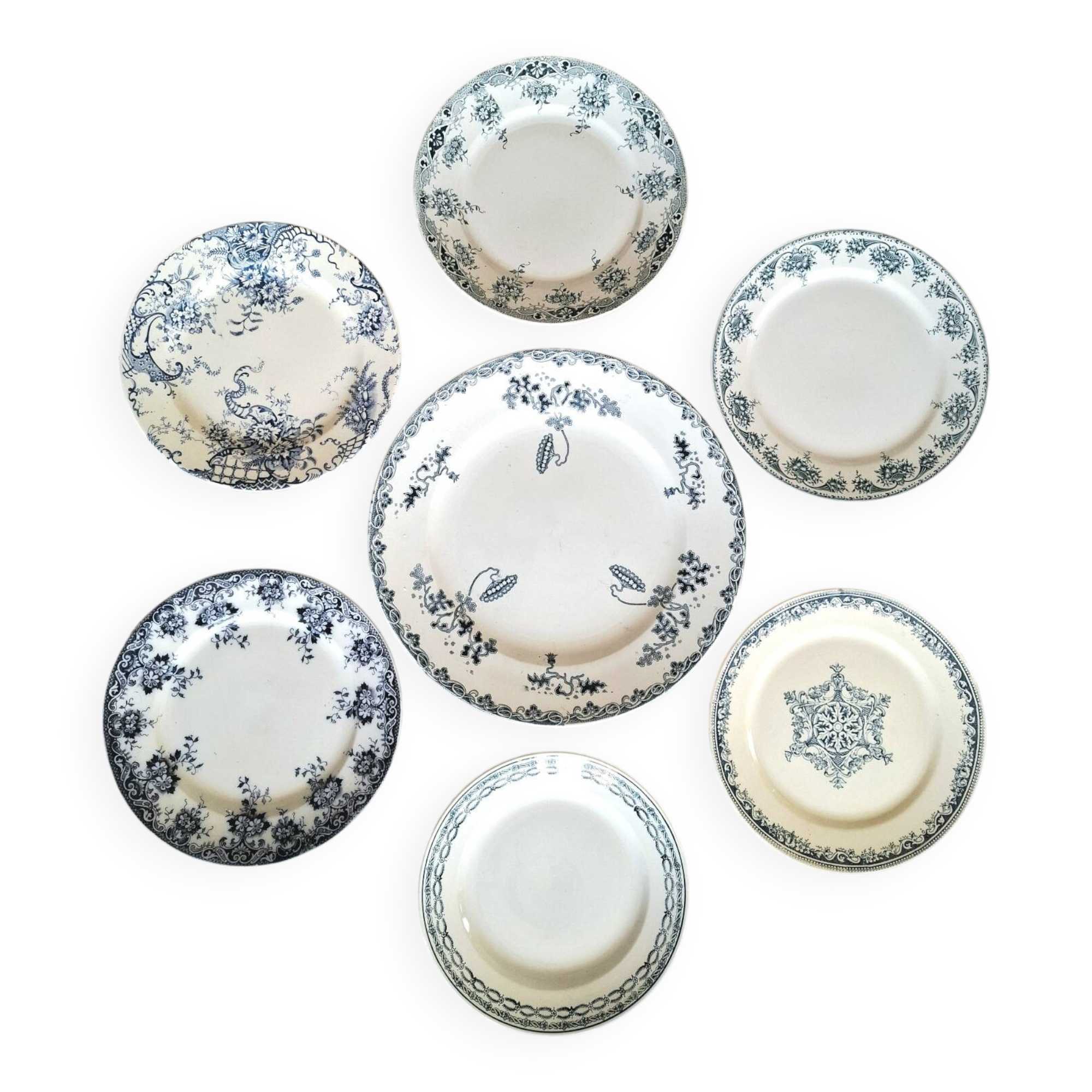 Antique earthenware dessert plates accompanied by a dish