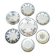 Antique earthenware dessert plates accompanied by a dish