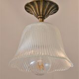 Suspension in striated glass and gilded metal