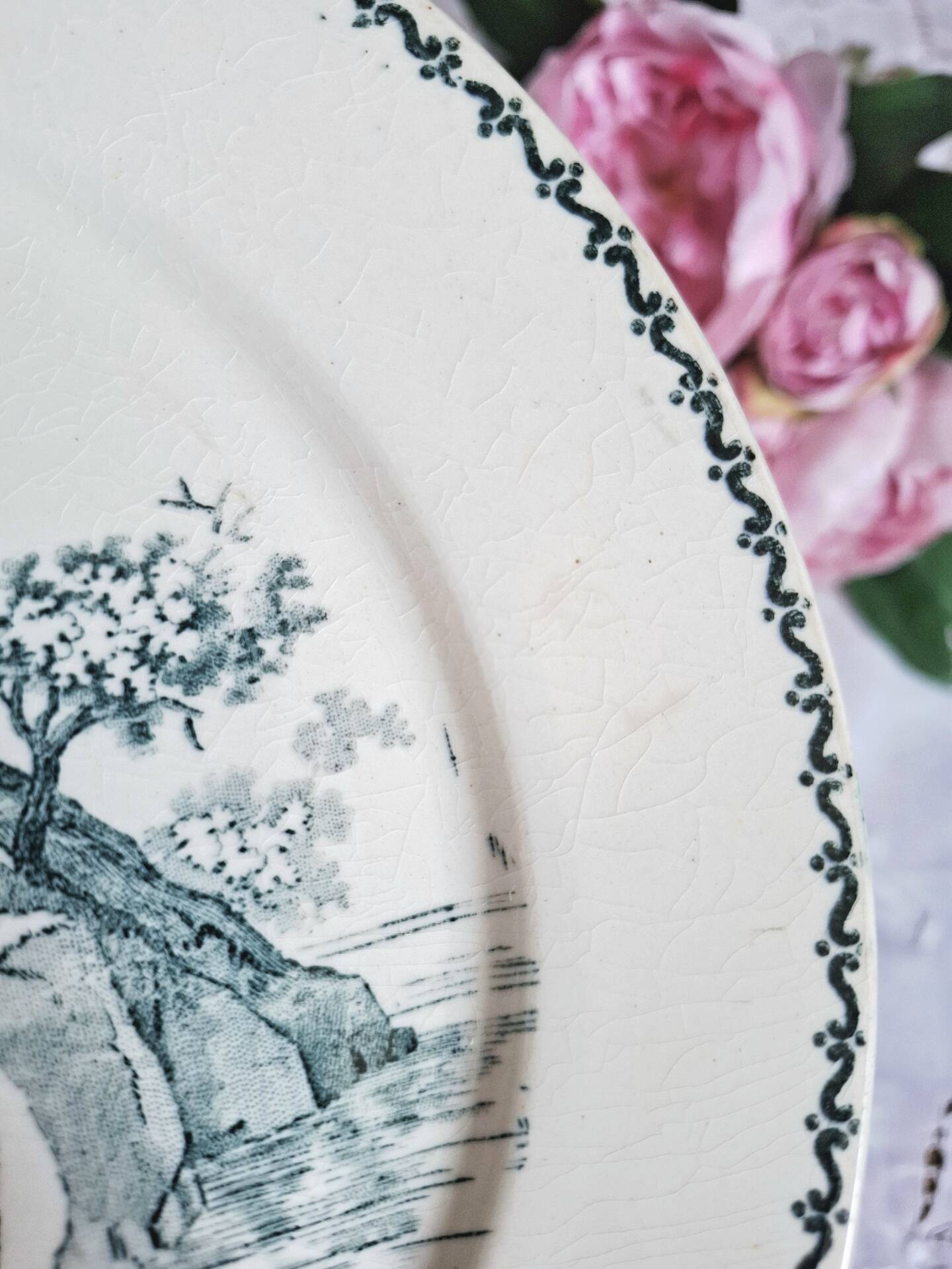 Old mismatched flat plates made of ironstone earthenware.