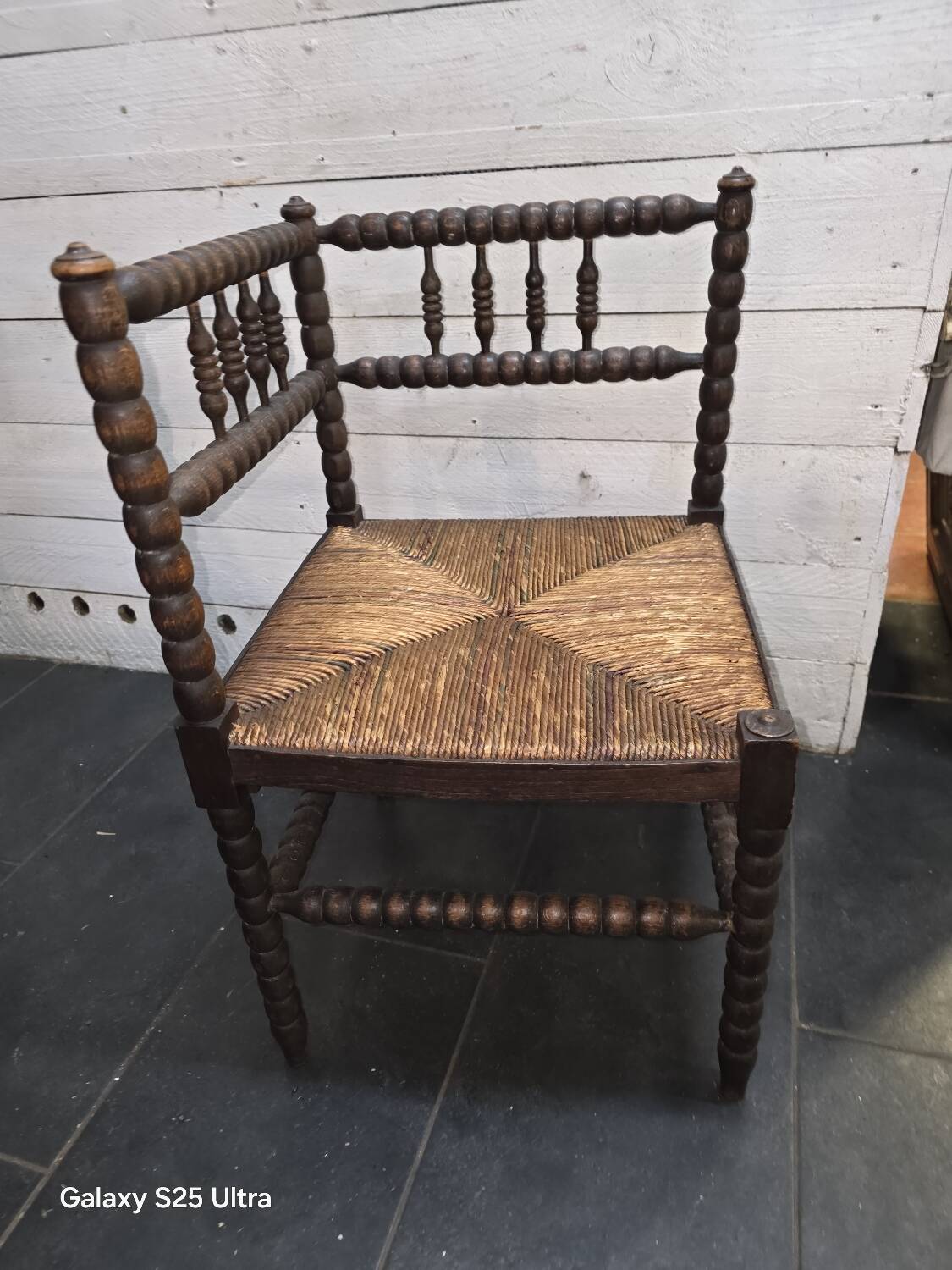 Antique corner fireplace armchair