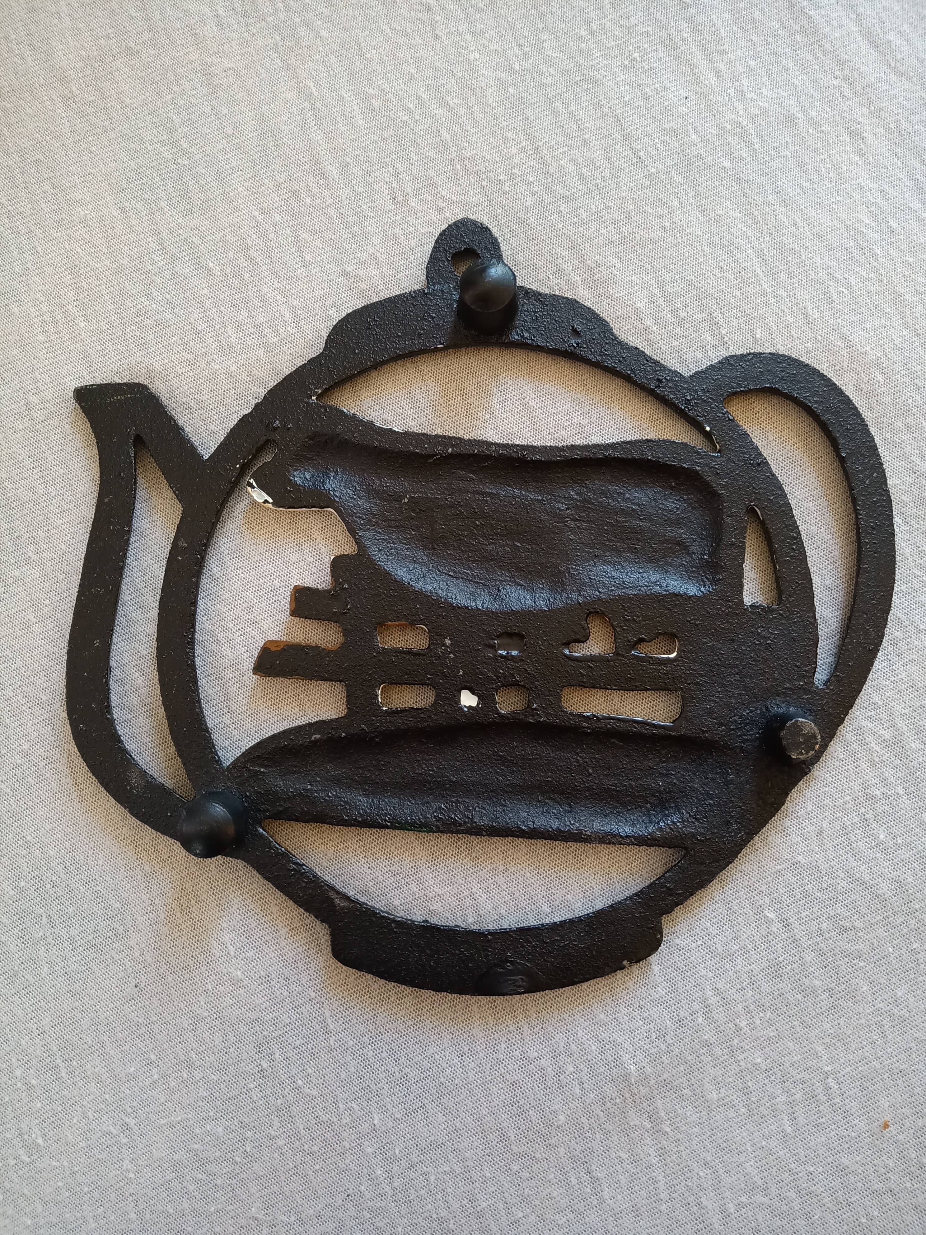 Vintage cast iron tablemat