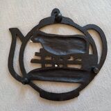 Vintage cast iron tablemat
