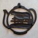 Vintage cast iron tablemat