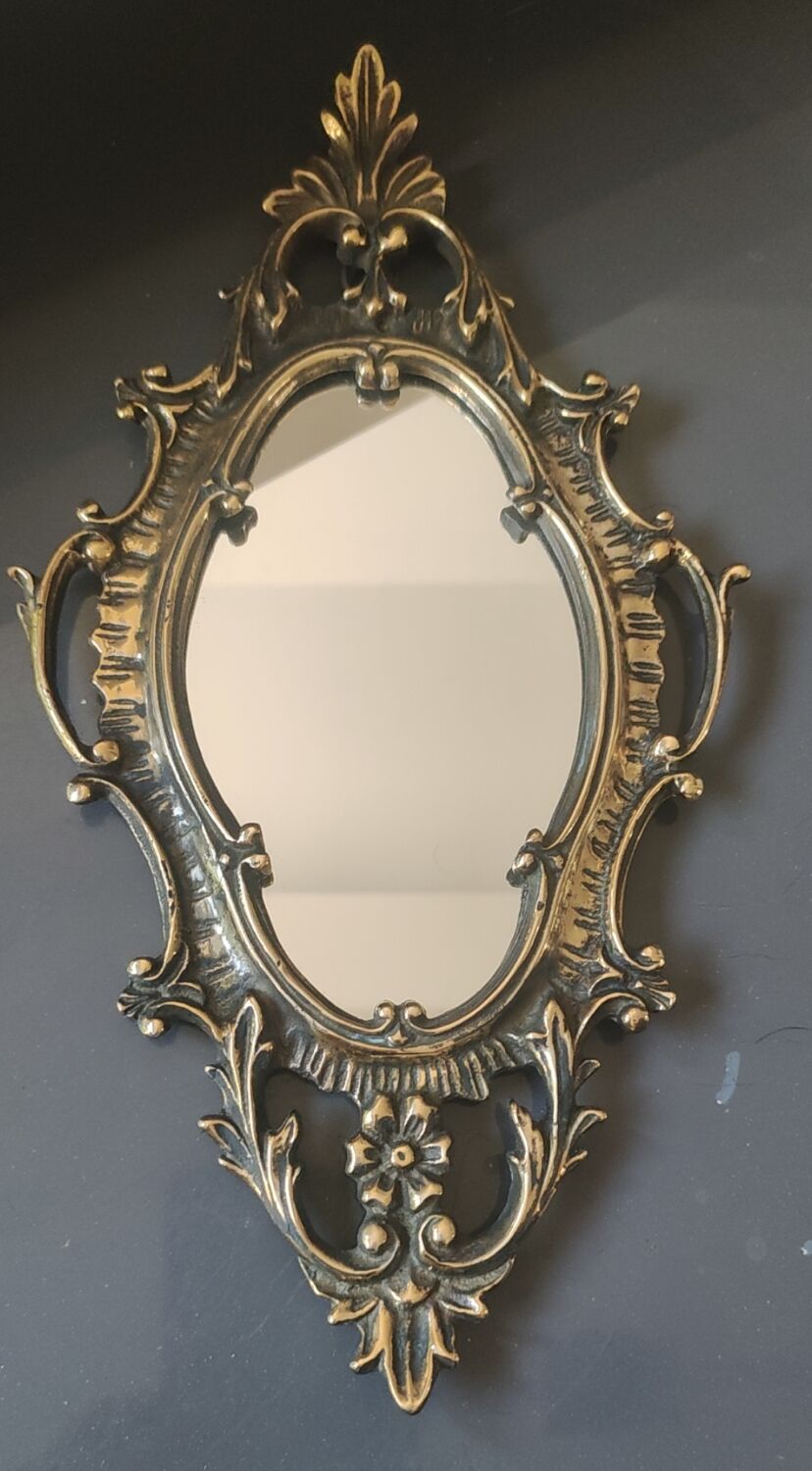 Antique gilded bronze wall mirror. Rococo/Baroque style. Dimensions 31x17cm.