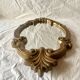 Vintage wall mirror in gold resin