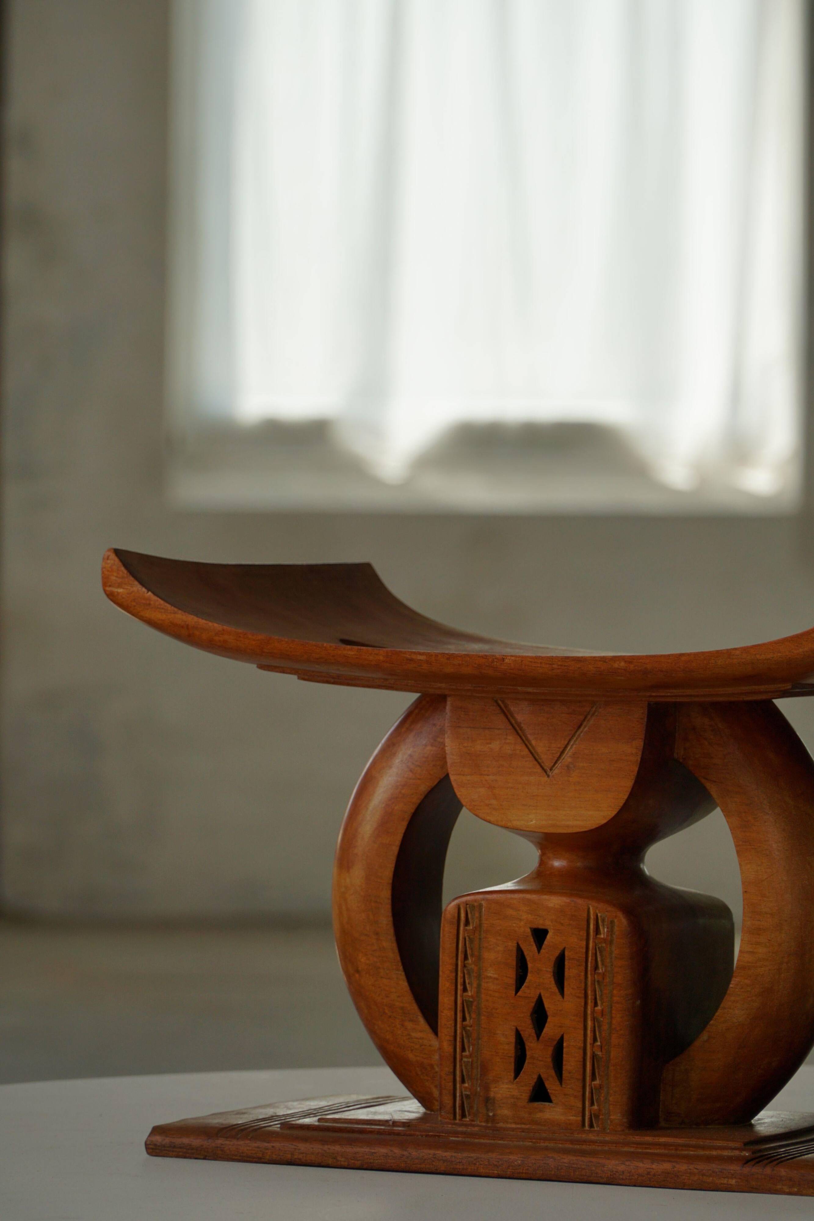 Ashanti stool from West Africa, carved from hardwood, 20th century.
