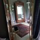 Large mirror has parcloses sheaf of wheat  96x186cm