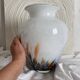 Large blown glass vase with polychrome inclusions in the Murano style.
