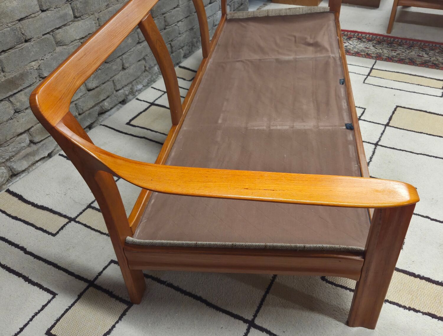 Danish canapé and its 1970s teak armchair