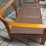 Danish canapé and its 1970s teak armchair