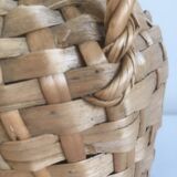 Old lady-jeanne dressed in vintage rattan