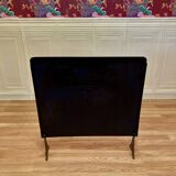 Metal fireplace screen from the period.