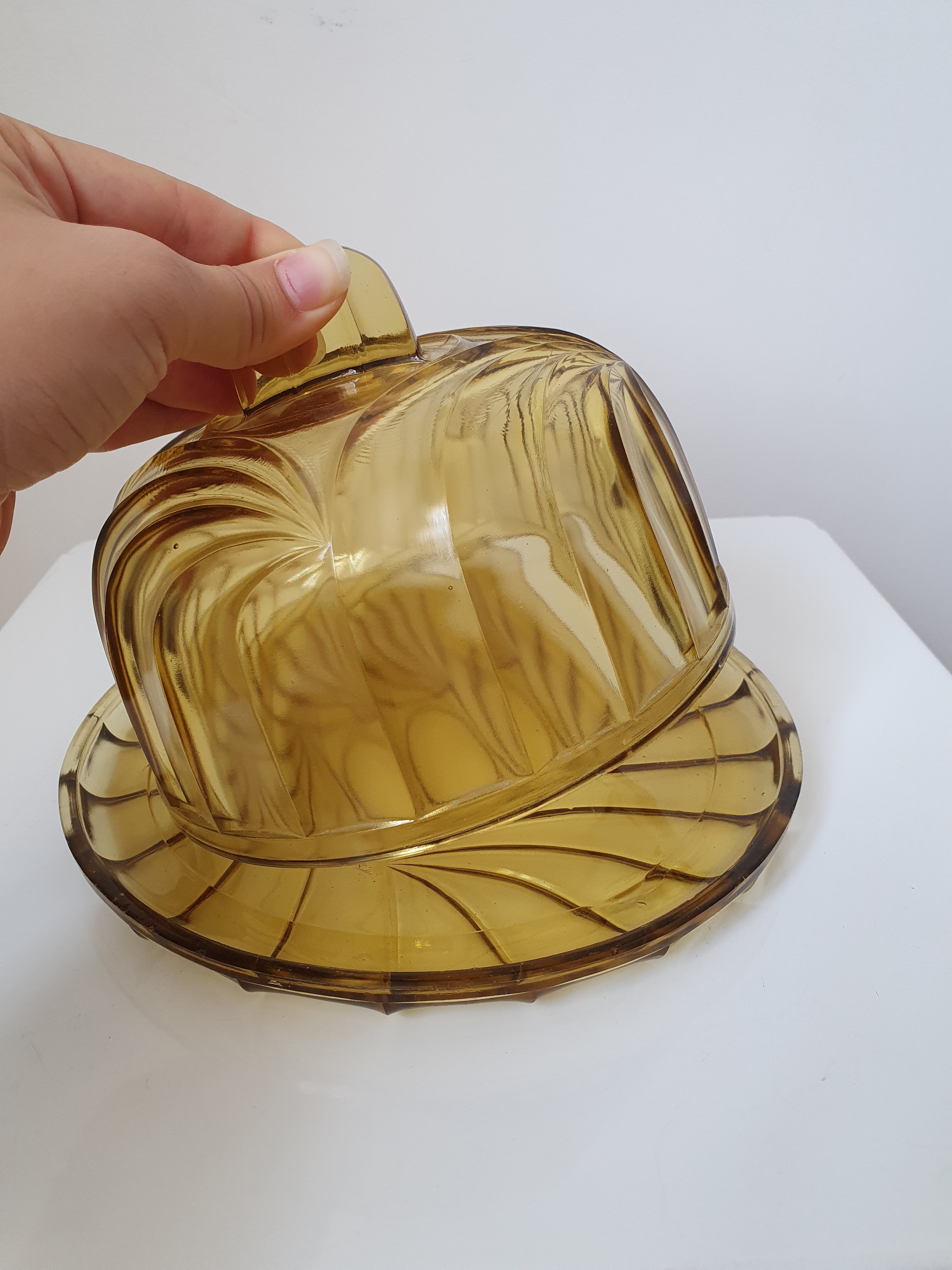 Bell and smoked yellow glass dish