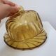 Bell and smoked yellow glass dish
