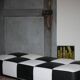Roche Bobois black and white checkered leather bench, low bench.