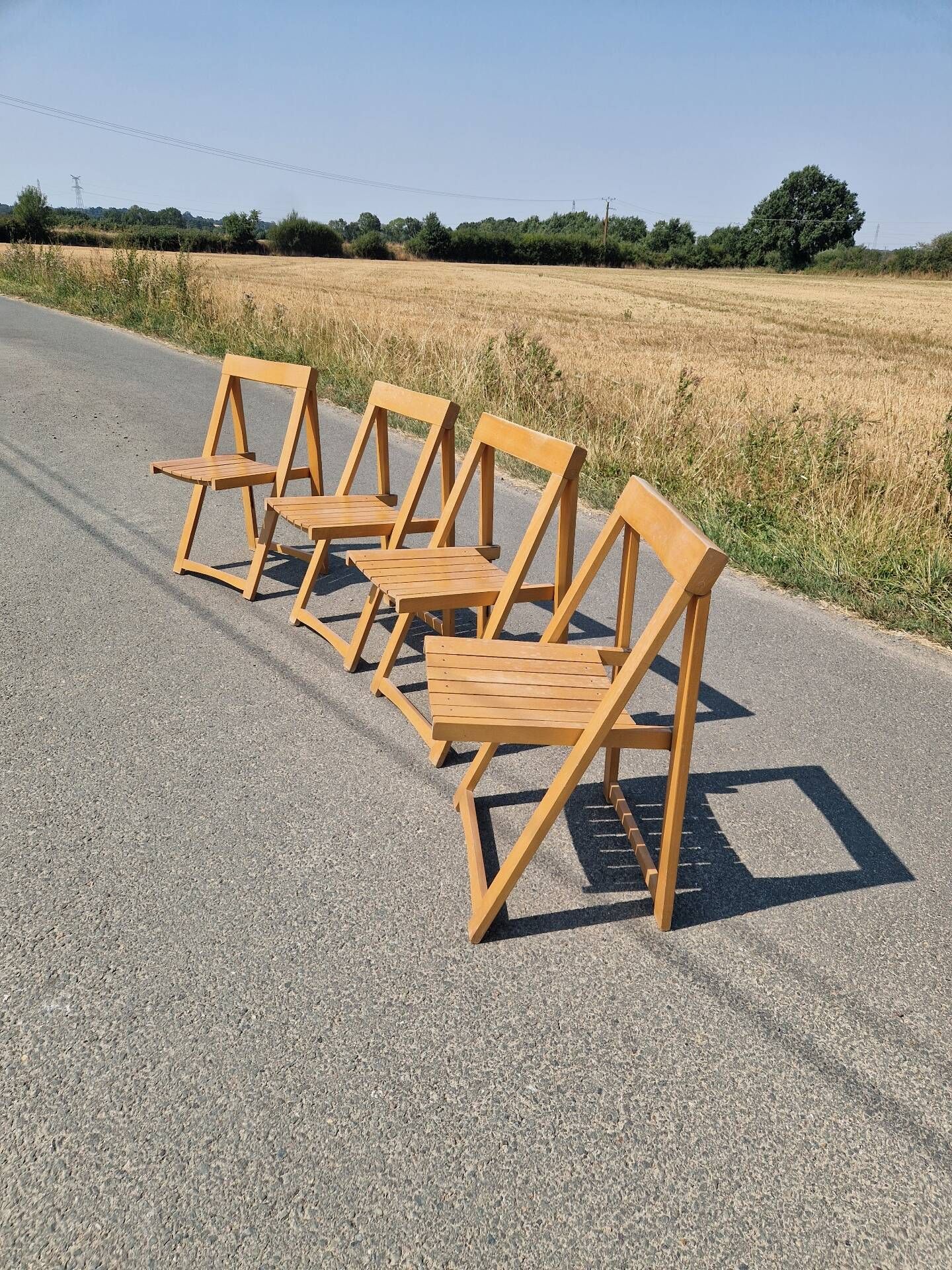 Set of 4 folding chairs by Aldo Jacober