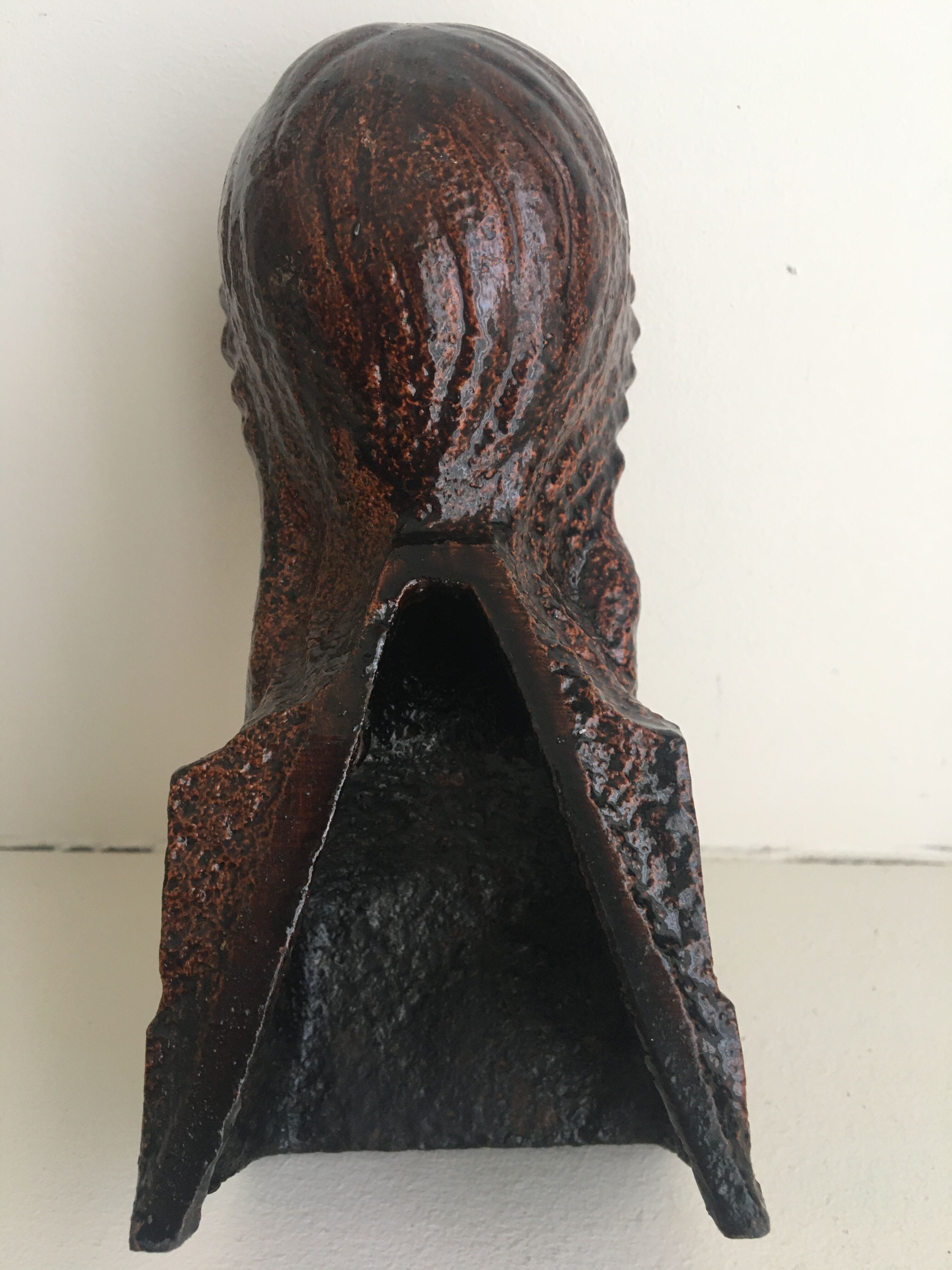 Glazed cast iron bust