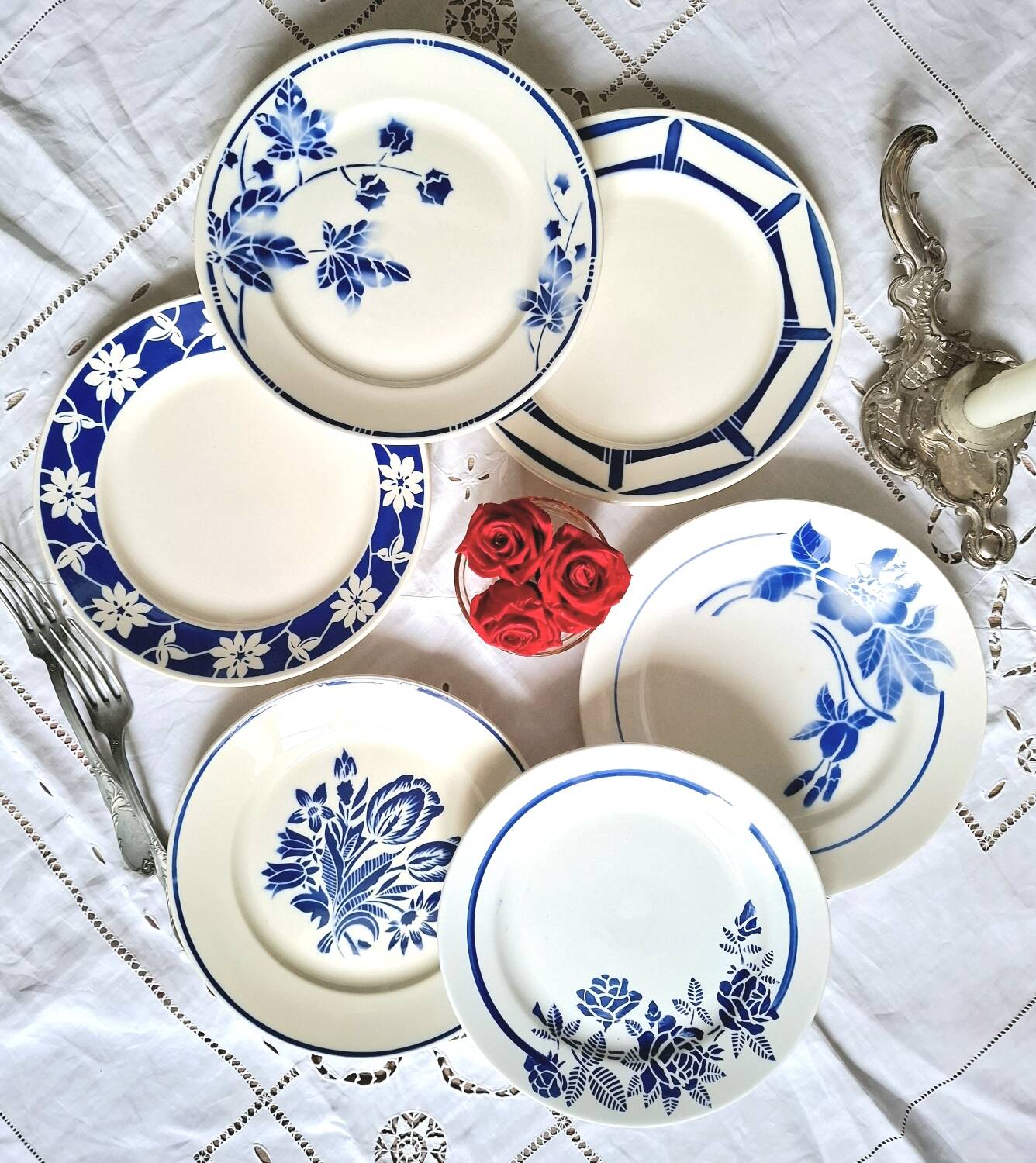Mismatched antique flat plates in earthenware