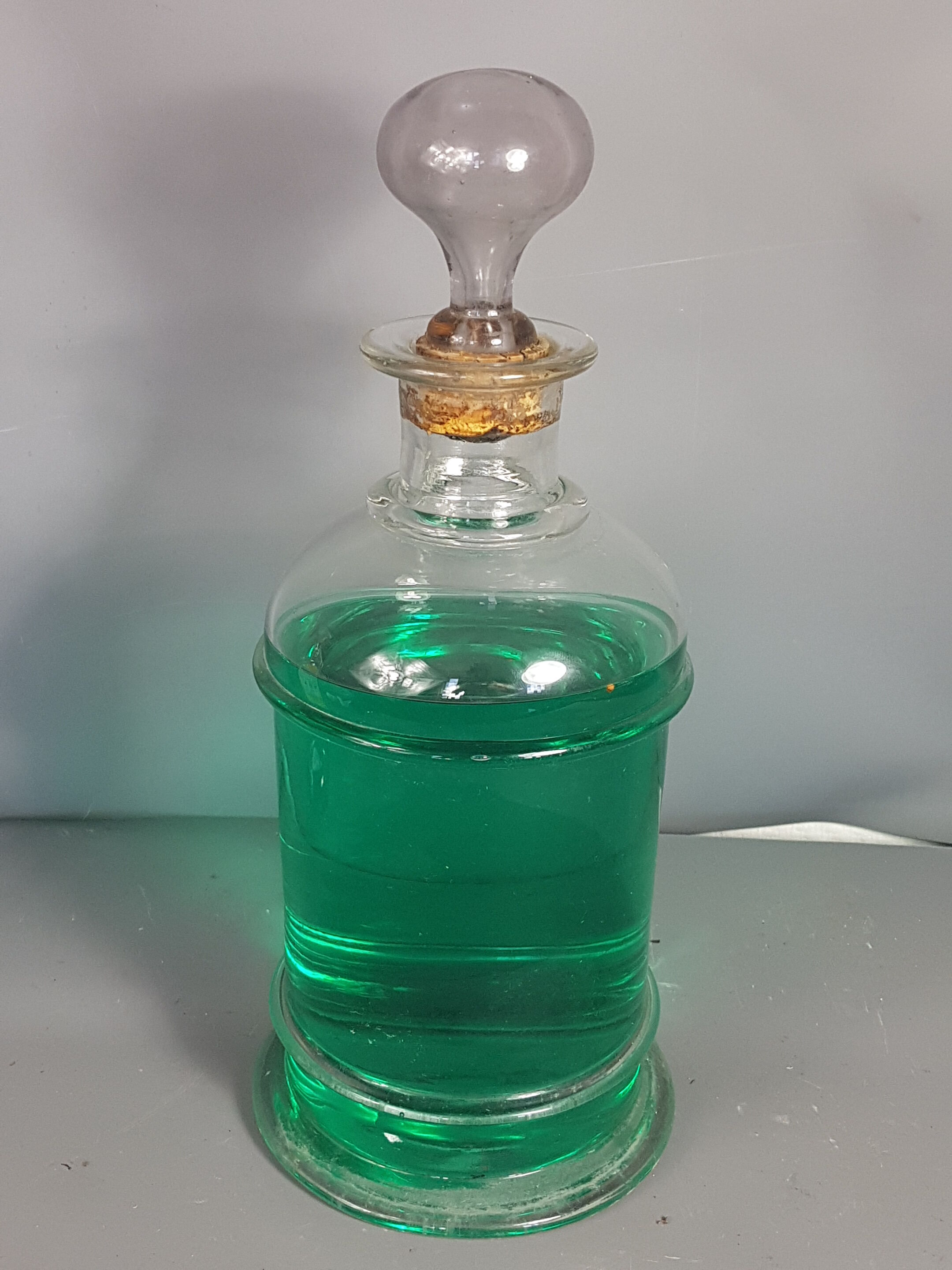 Old bottle of 19th century blown glass