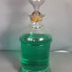 Old bottle of 19th century blown glass