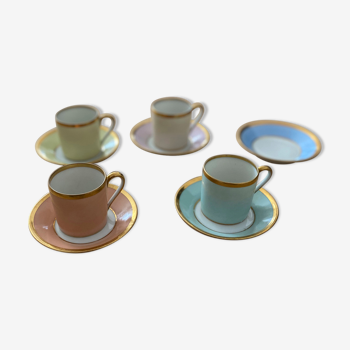 Set de quatre tasses à café et cinq sous-tasses en porcelaine de limoges vers 1900