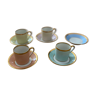 Set de quatre tasses à café et cinq sous-tasses en porcelaine de limoges vers 1900