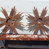 2 wooden sun mirrors and golden plaster