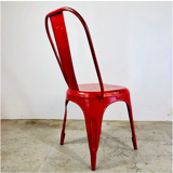 Set of four low chairs in red steel