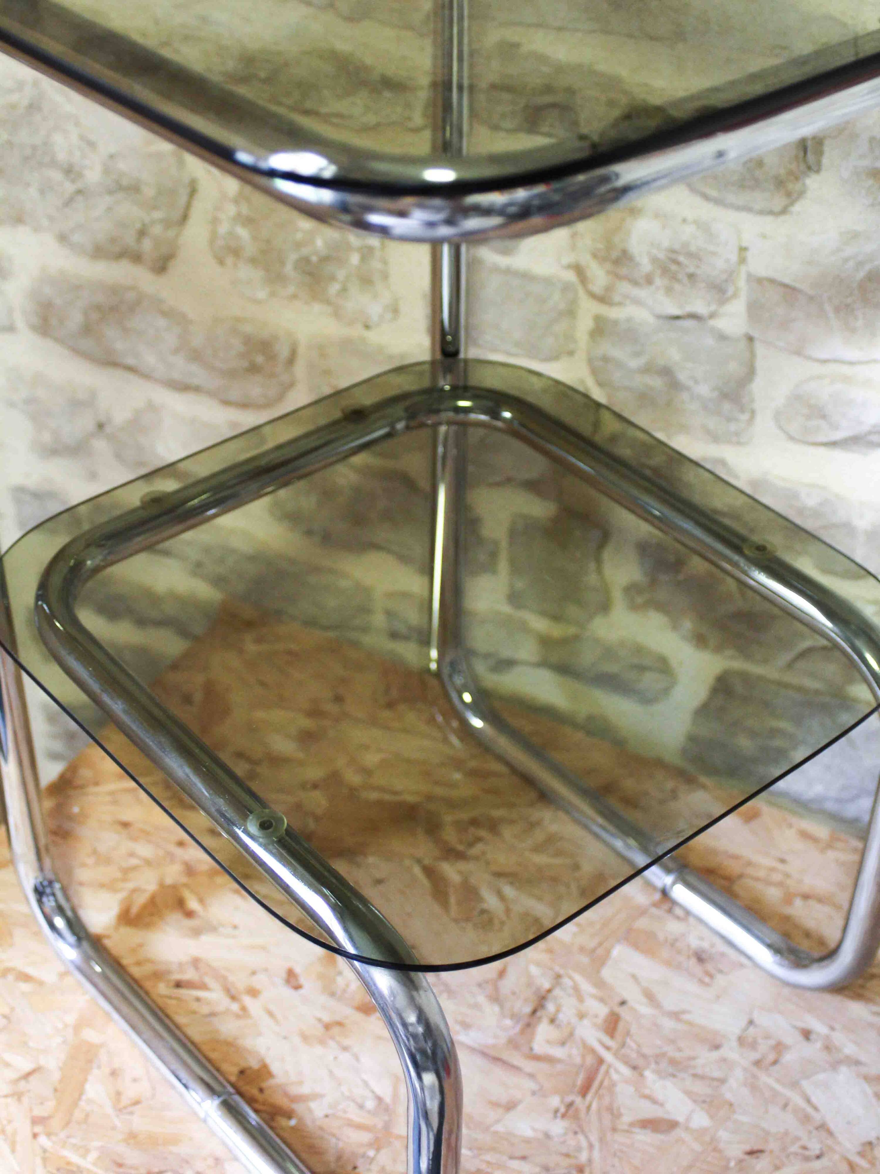 Chrome metal and smoked glass side table.