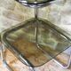 Chrome metal and smoked glass side table.