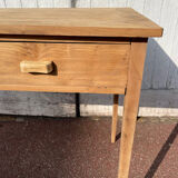 Vintage wooden desk with two drawers.