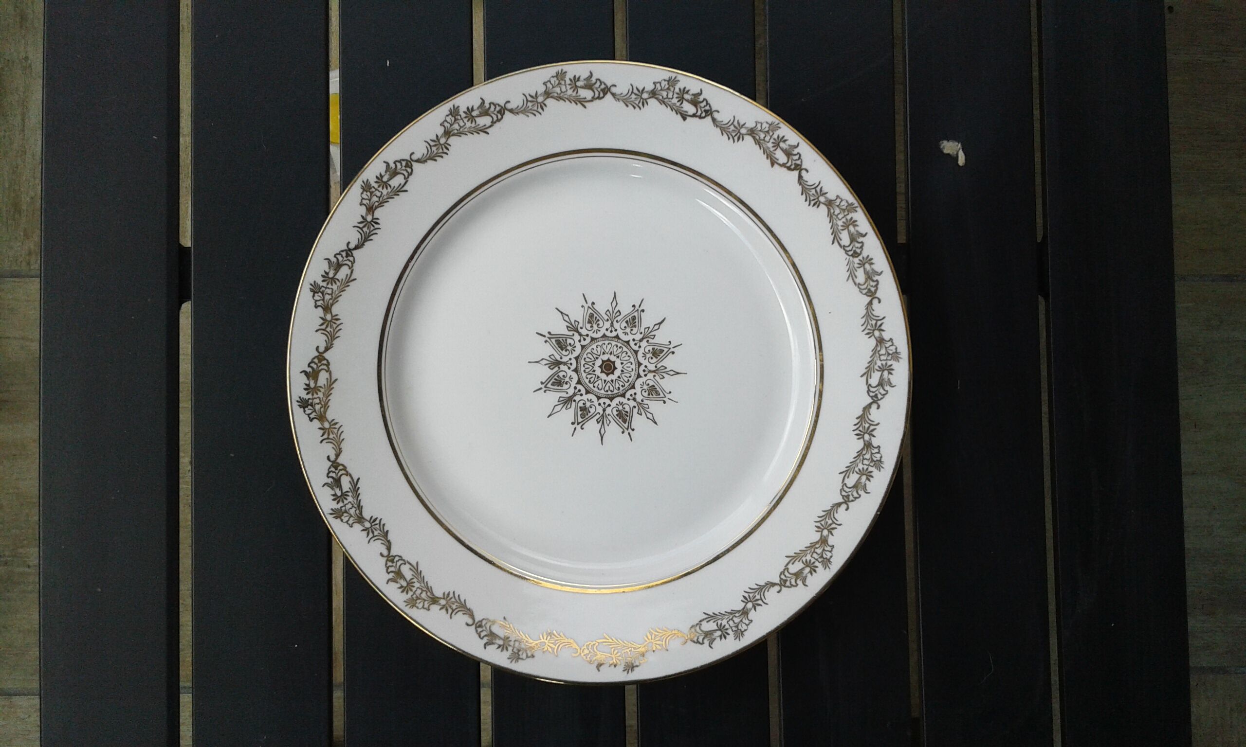 6 porcelain hollow plates, signed LJ & cie