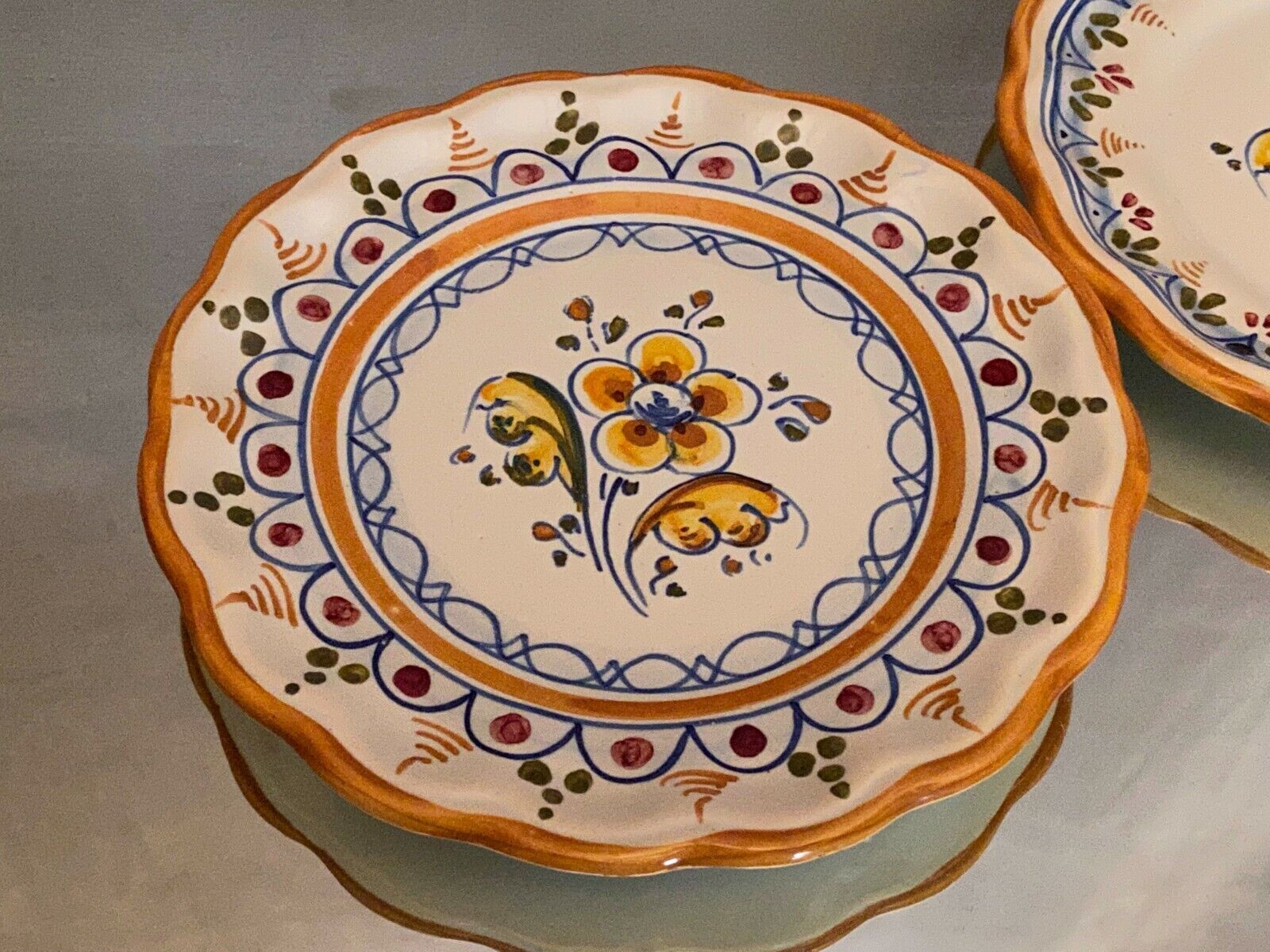 Pair of Talavera earthenware plates with floral decoration