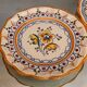 Pair of Talavera earthenware plates with floral decoration