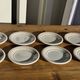 Set of 9 small Italian dessert plates Primula with red and green trim.