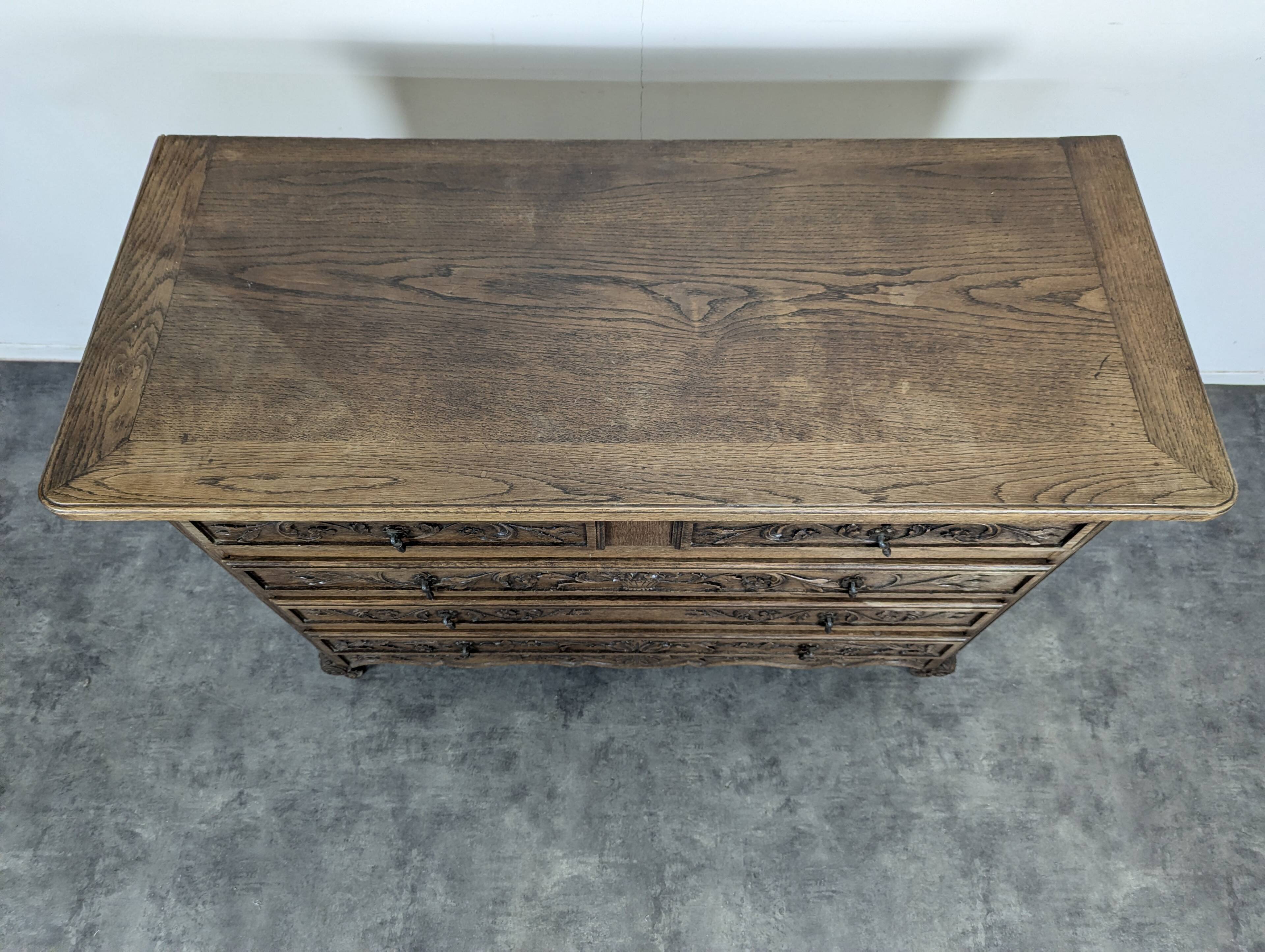 Carved neo-rustic commode in Norman style