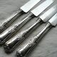 Service de 12 couteaux de table métal argenté